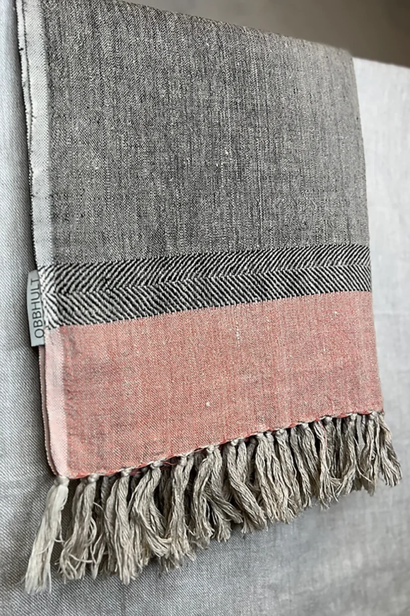 Linnepläd med frans aprikos/svart 130x70 cm