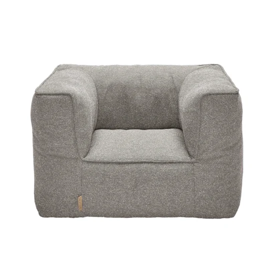 Grow fåtölj i tyget bouclé earth.