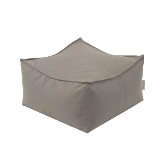 Stay sittpuff i tyg i färgen taupe.