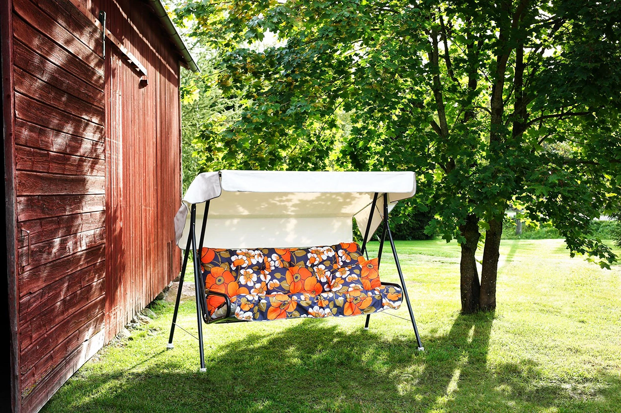 Miljöbild av Nostalgi orange hammockset från Varax.