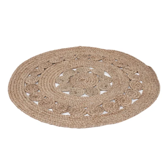 Amara matta i sjögräs från Hillerstorp. Rund matta med flätat blommönster.