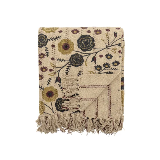 Eydis blom-mönstrad pläd i färgen nature.